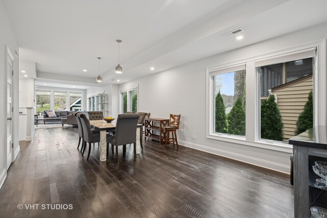 dining room featuring recessed lighting, baseboards, visible vents, and dark wood-style floors