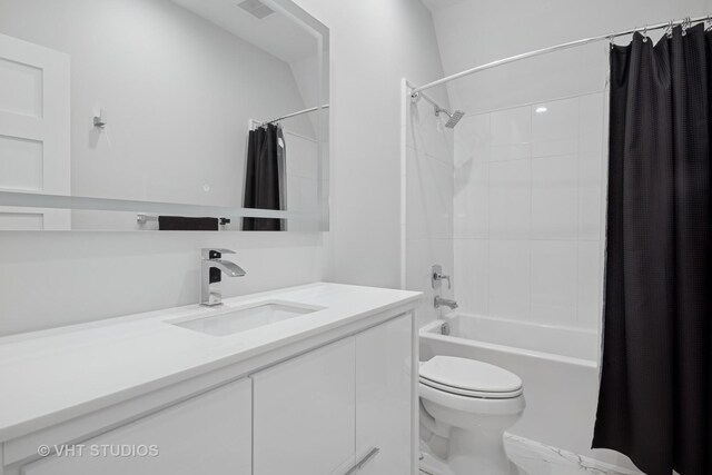 bathroom with shower / tub combo, vanity, toilet, and visible vents