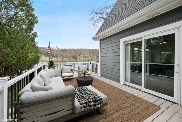 wooden deck featuring outdoor lounge area