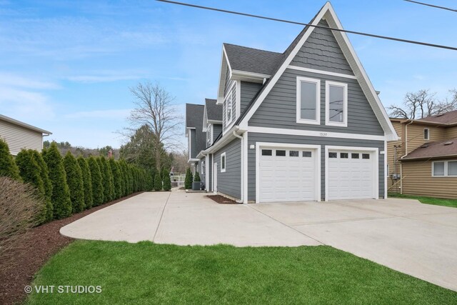 view of property exterior featuring a garage, driveway, and roof with shingles