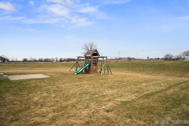 view of play area with a yard