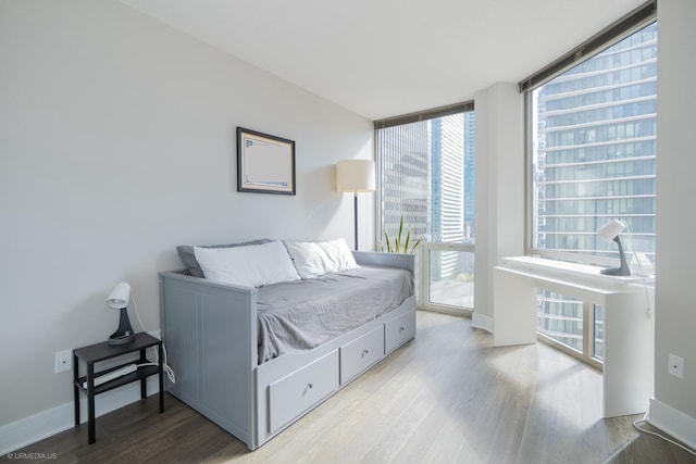222 N Columbus Dr Unit 1509, Chicago, IL 60601 - bedroom with wood finished floors and baseboards