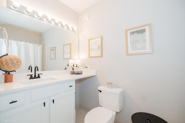 222 N Columbus Dr Unit 1509, Chicago, IL 60601 - full bath featuring curtained shower, tile patterned floors, toilet, vanity, and baseboards