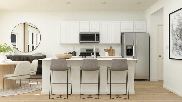 14806 S Hillside Dr S, Lockport, IL 60441 - kitchen with stainless steel appliances, light wood finished floors, a breakfast bar, and white cabinetry