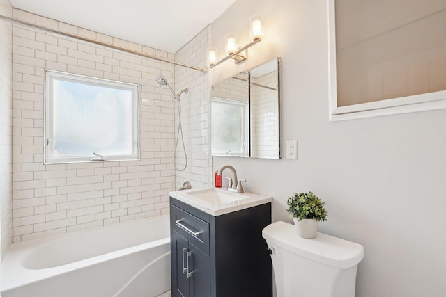 bathroom with shower / bath combination, vanity, and toilet