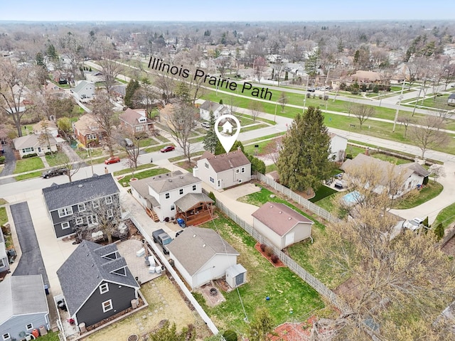 birds eye view of property with a residential view