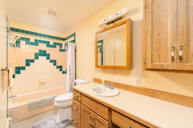 3449 E Cleveland St, Ladd, IL 61329 - bathroom featuring shower / tub combo, a baseboard heating unit, toilet, visible vents, and vanity