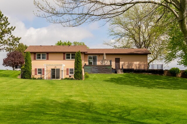 3449 E Cleveland St, Ladd, IL 61329 - back of house featuring a yard and a wooden deck