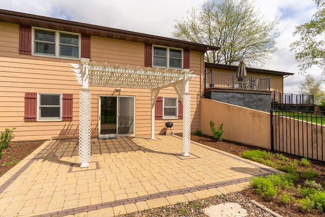3449 E Cleveland St, Ladd, IL 61329 - back of property with a patio area, a pergola, and fence