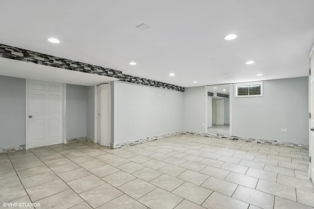 finished basement with recessed lighting