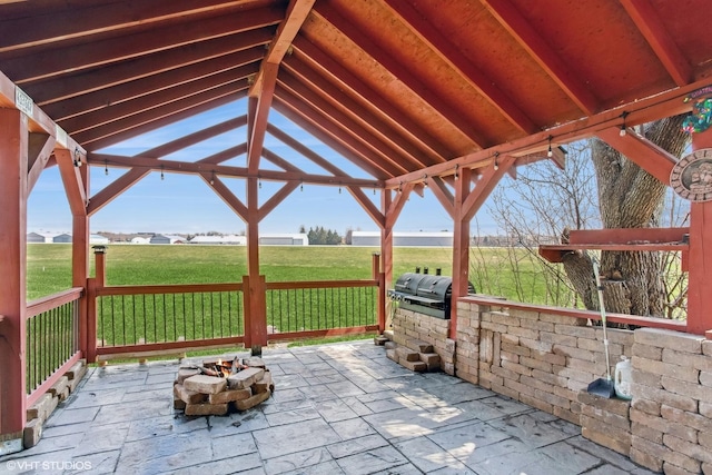 view of patio / terrace with a gazebo, grilling area, and an outdoor fire pit