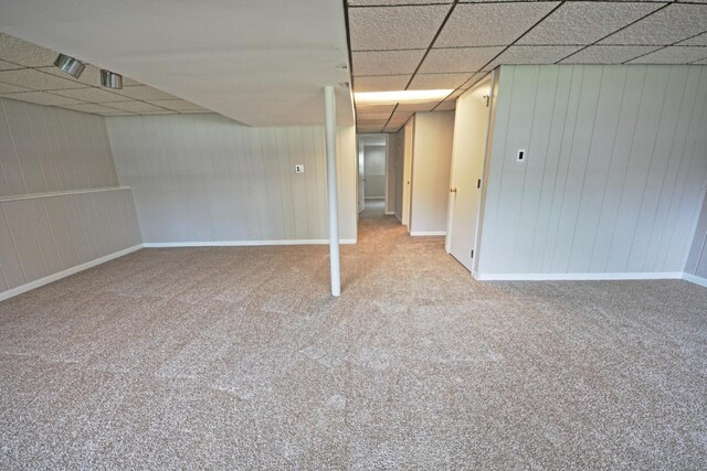 6140 El Morro Ln, Oak Forest, IL 60452 - finished below grade area with carpet, baseboards, wooden walls, and a paneled ceiling