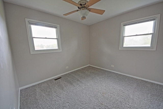6140 El Morro Ln, Oak Forest, IL 60452 - carpeted spare room featuring baseboards and a ceiling fan