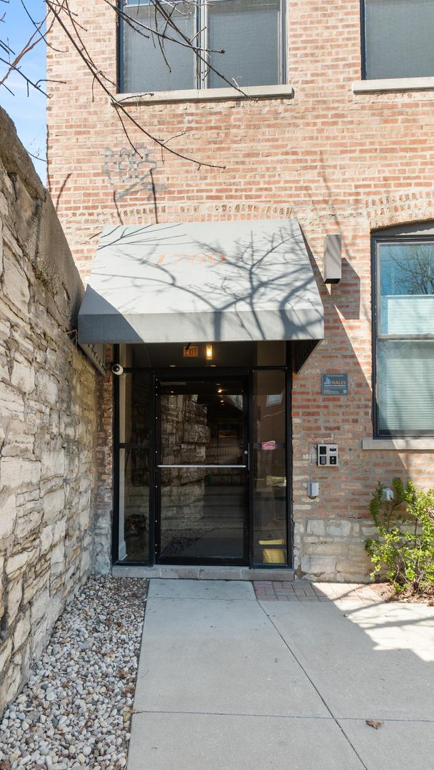 1760 W Wrightwood Ave Unit 305, Chicago, IL 60614 - view of exterior entry with brick siding