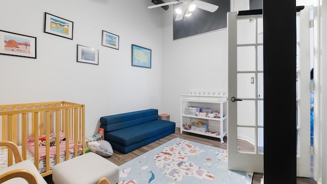 1760 W Wrightwood Ave Unit 305, Chicago, IL 60614 - bedroom featuring wood finished floors and a nursery area