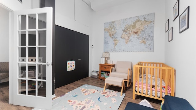 1760 W Wrightwood Ave Unit 305, Chicago, IL 60614 - bedroom with a crib and wood finished floors
