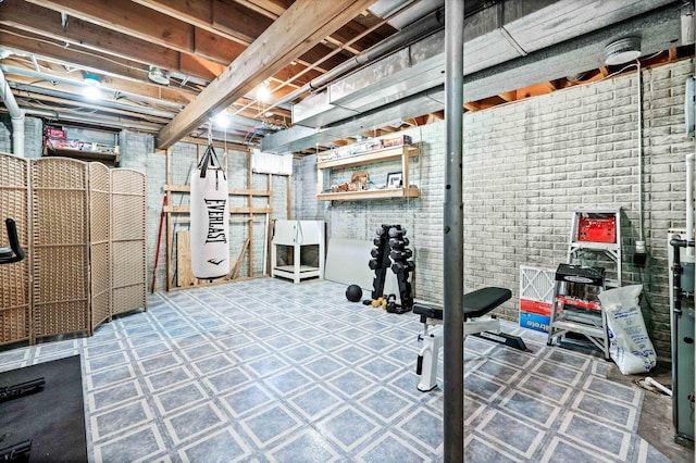 unfinished basement with brick wall