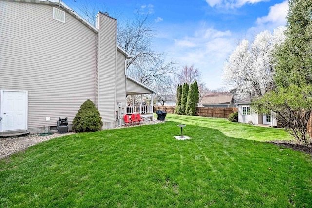 view of yard featuring fence