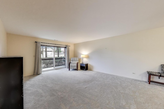 unfurnished room with carpet floors