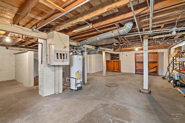 unfinished basement with gas water heater