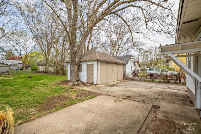 exterior space with fence and an outdoor structure