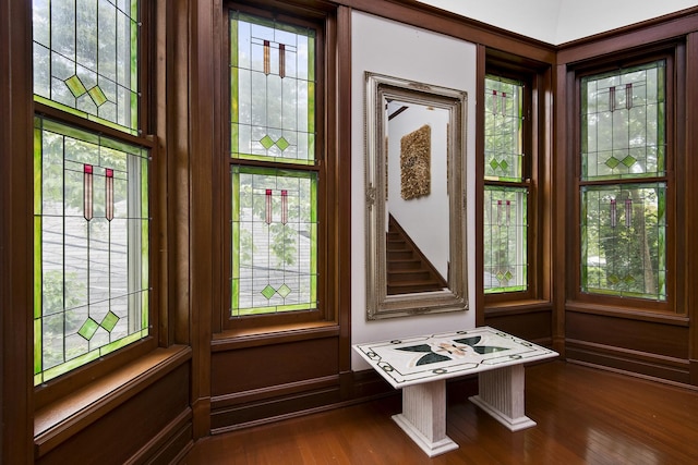 details with baseboards and wood finished floors