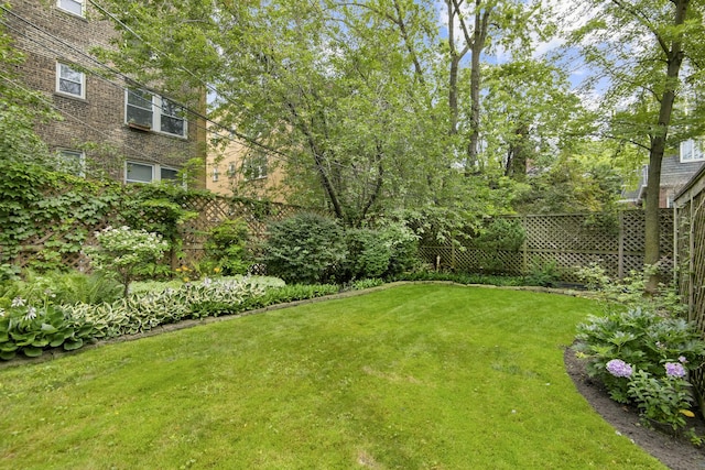 view of yard with fence