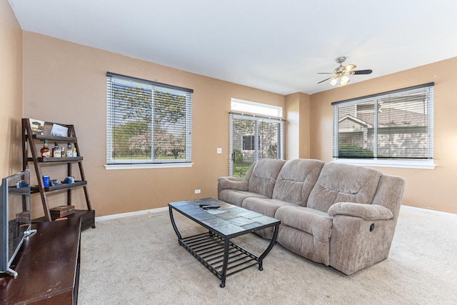 88 Keeneland Ct, Grayslake, IL 60030 - carpeted living area featuring baseboards and ceiling fan