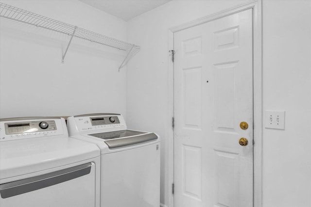 3410 Waterville Ct, Champaign, IL 61822 - clothes washing area with washing machine and clothes dryer and laundry area