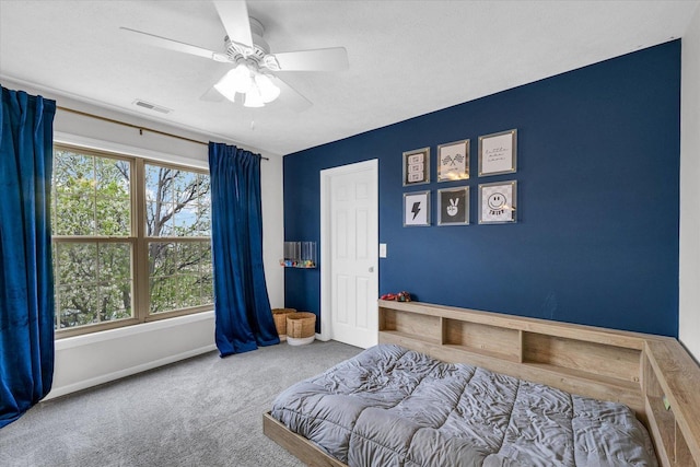 3410 Waterville Ct, Champaign, IL 61822 - bedroom with ceiling fan, carpet floors, visible vents, and baseboards