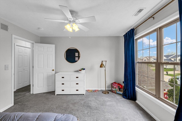 3410 Waterville Ct, Champaign, IL 61822 - carpeted bedroom featuring visible vents, a ceiling fan, and baseboards