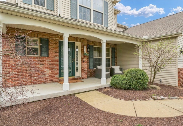 3410 Waterville Ct, Champaign, IL 61822 - property entrance with brick siding and a porch