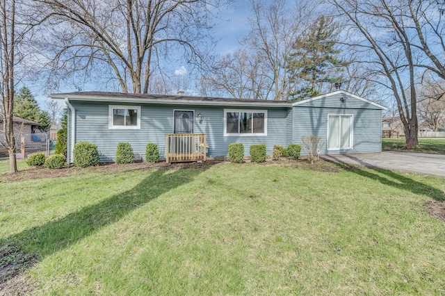 16112 Turner Ave, Markham, IL 60428 - ranch-style house with a front yard and fence