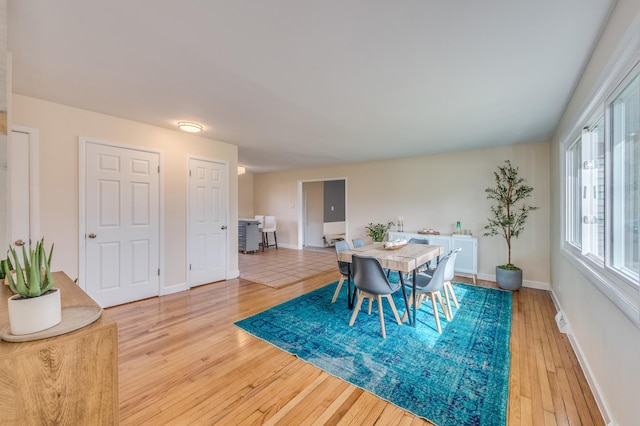 16112 Turner Ave, Markham, IL 60428 - dining area with light wood-style flooring and baseboards