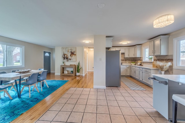 16112 Turner Ave, Markham, IL 60428 - carpeted living area with a glass covered fireplace, recessed lighting, visible vents, and baseboards