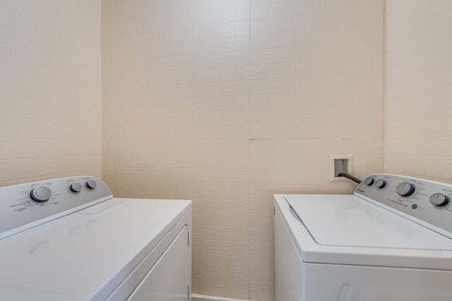 16112 Turner Ave, Markham, IL 60428 - laundry area with washer and dryer, laundry area, and tile walls