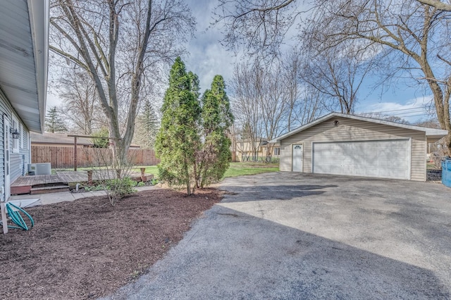 16112 Turner Ave, Markham, IL 60428 - view of yard with a garage, central AC, an outdoor structure, and fence
