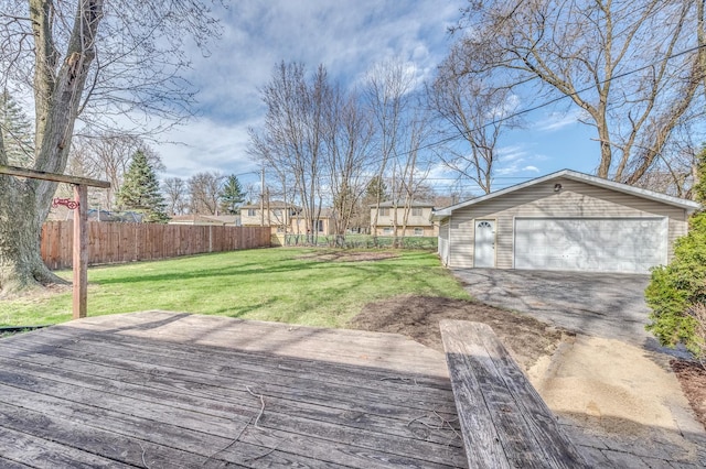 16112 Turner Ave, Markham, IL 60428 - wooden deck featuring a garage, a yard, fence, and an outbuilding