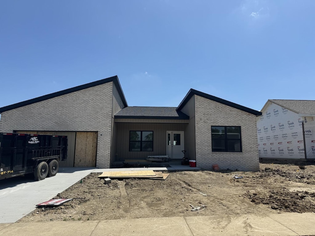 2903 Haydon Dr, Urbana, IL 61802 - view of front of home featuring brick siding and a garage