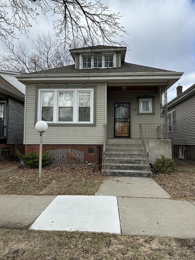 8444 S Essex Ave, Chicago, IL 60617 - bungalow featuring a porch, crawl space, and roof with shingles