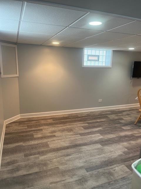 5705 S Mayfield Ave, Chicago, IL 60638 - below grade area featuring wood finished floors, baseboards, and a drop ceiling