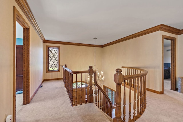 4001 Wyndwood Dr, Crystal Lake, IL 60014 - hallway with crown molding, baseboards, an upstairs landing, and carpet