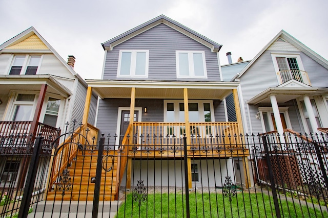 3621 N Richmond St, Chicago, IL 60618 - view of front of house with covered porch and a fenced front yard