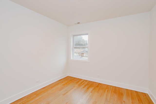 3621 N Richmond St, Chicago, IL 60618 - spare room featuring light wood finished floors, baseboards, and visible vents