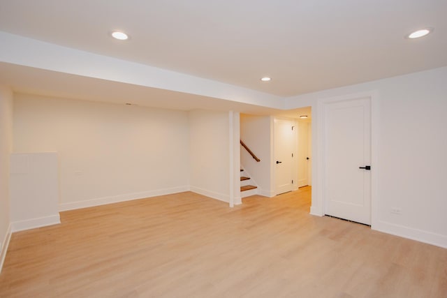 3621 N Richmond St, Chicago, IL 60618 - finished below grade area with recessed lighting, stairs, and light wood finished floors