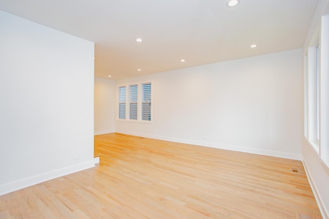 3621 N Richmond St, Chicago, IL 60618 - spare room featuring recessed lighting, light wood finished floors, and baseboards