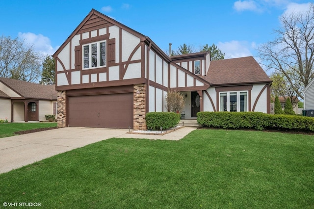 english style home featuring a front lawn, driveway, a garage, stucco siding, and brick siding
