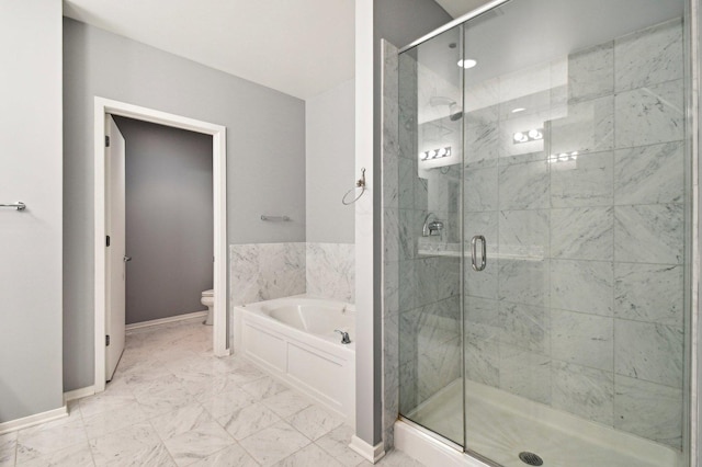 65 E Monroe St Unit 4521, Chicago, IL 60603 - full bathroom with a bath, baseboards, toilet, marble finish floor, and a stall shower