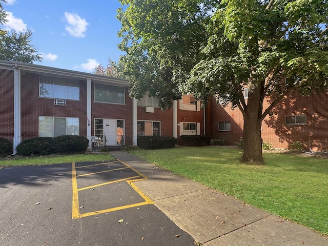 124 N Whistler Ave Unit B8, Freeport, IL 61032 - view of building exterior featuring uncovered parking