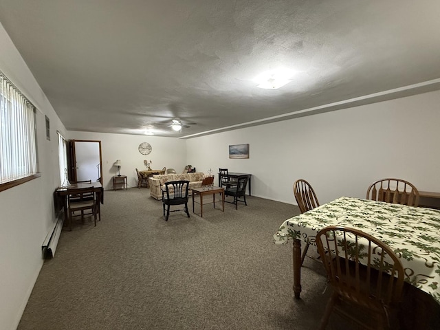 124 N Whistler Ave Unit B8, Freeport, IL 61032 - carpeted dining space with baseboard heating, ceiling fan, and visible vents